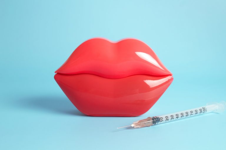 red lips with needle