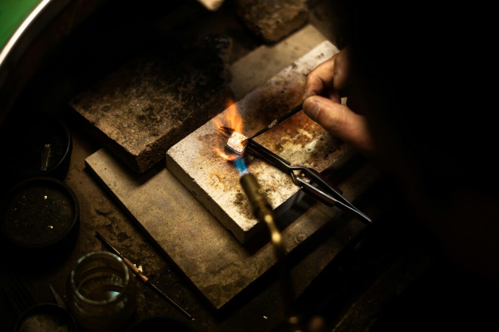 a person lighting a candle
